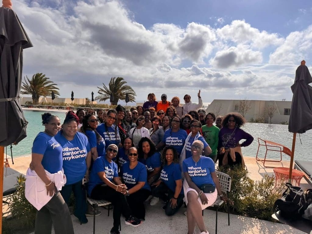 Travels divas group picture in Greece poolside.