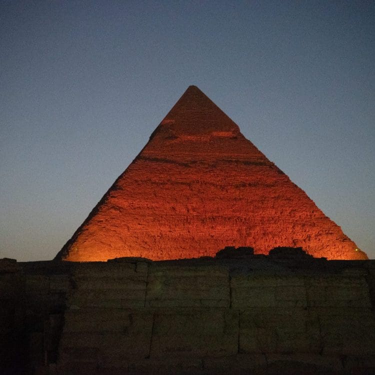 Nightime view of the pyramids in Egypt - Travel Divas
