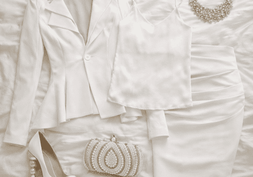 Elegant white ensemble on soft bedding