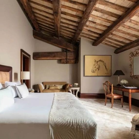 imgi_58_anantara_palazzo_naiadi_rome_hotel_premium_room_clementino_bed_sofa_880x620